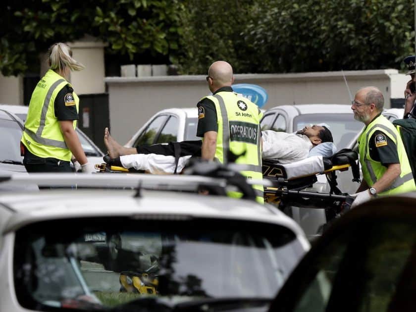 CHRISTCHURCH Ambulance staff take a man from outside a mosque in central Christchurch