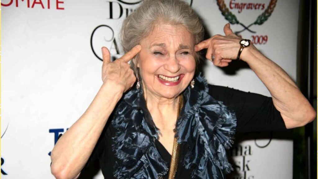 Lynn Cohen, an actor, best known for playing the plainspoken housekeeper and nanny Magda in Sex and the City, has died. She was 86. Cohen died on Friday in New York City, said her manager, Josh Pultz. Additional details were not immediately available. A native of Kansas City, Missouri, Cohen had a long and diverse career as a stage, film and television performer. Her dozens of credits ranged from Nurse Jackie and The Marvelous Mrs. Maisel to the feature films Across the Universe and The Hunger Games: Catching Fire. In HBO's Sex and City, Cohen's character was used by attorney Miranda Hobbes, played by Cynthia Nixon. Magda was featured in the TV and movie versions of the popular show, which also starred Sarah Jessica Parker, Kristin Davis, and Kim Cattrall. Life and career - Lynn Cohen Lynn Cohen born on August 10, 1933, and died February 14, 2020. She was an American actress, best known for playing Magda in the HBO series Sex and the City and the 2008 film of the same name, as well as its 2010 sequel, and Mags in Cohen was born as Lynn Harriette Kay in Kansas City, Missouri, and was Jewish. She began her career appearing on the Off-Broadway productions as of the 1970s, receiving Drama League Award and Lucille Lortel Awards nominations. Cohen's first notable film role was in the 1993 comedy Manhattan Murder Mystery. From 1993 to 2006, she played Judge Elizabeth Mizener in the NBC drama series Law & Order, appearing total in 12 episodes. She also guest-starred on NYPD Blue, Law & Order: Special Victims Unit, Law & Order: Criminal Intent, and had a recurring role on Damages. From 2000 to 2004, Cohen had a recurring role as Magda in the HBO comedy series, Sex, and the City. She reprised her role in the 2008 film of the same name, as well as its 2010 sequel. Cohen also appeared in the movies Munich (2005) playing Golda Meir, Vanya on 42nd Street, Synecdoche, New York, Eagle Eye, and The Hunger Games: Catching Fire. According to her manager Josh Pultz, Cohen died on February 14, 2020, in New York. The cause of death not yet known at the time of post this story.