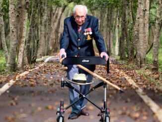 Captain Sir Tom Moore, who raised millions for the NHS, is dead at 100